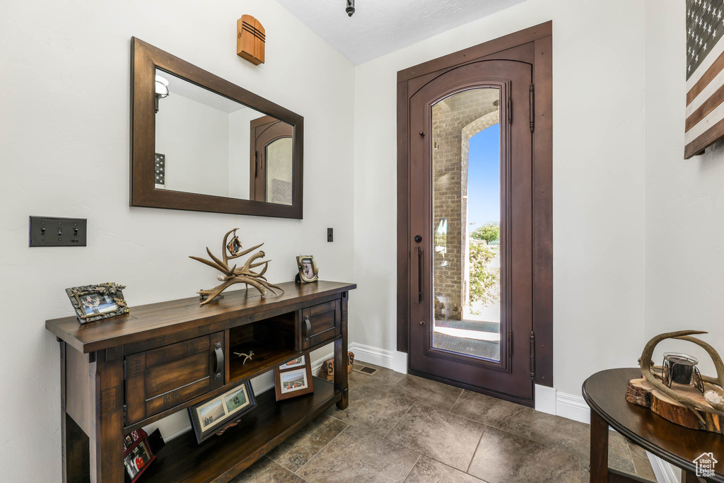 Entrance foyer with baseboards