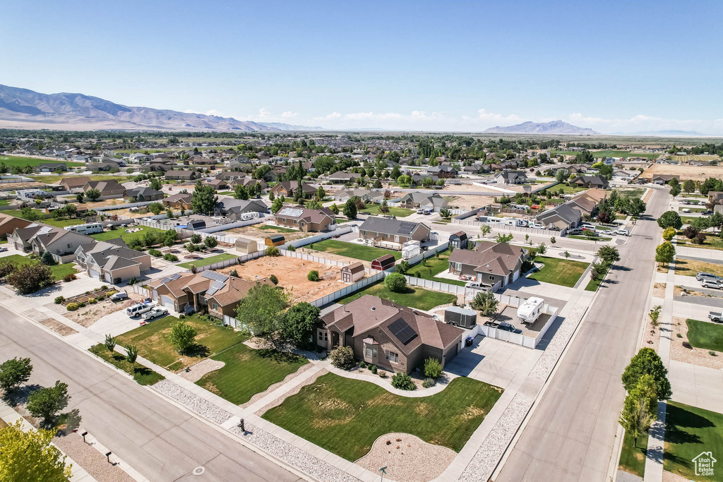 Aerial view of residential area with a mountain backdrop