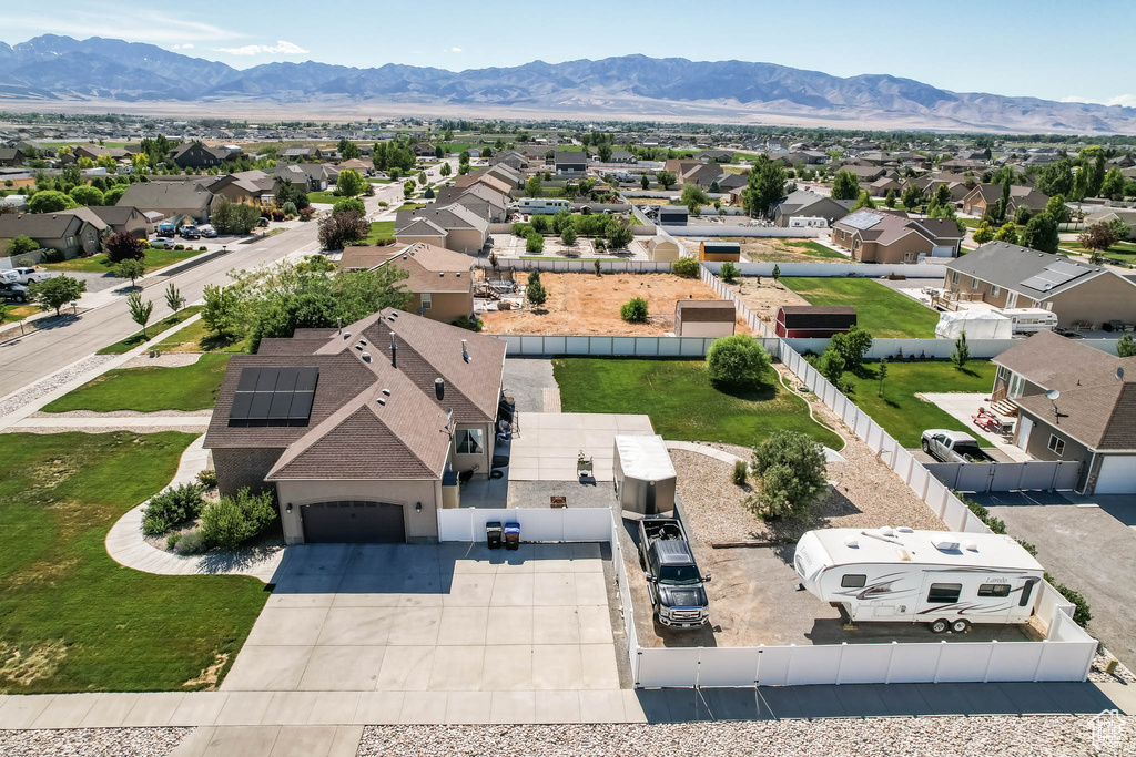 Aerial view of residential area with a mountainous background