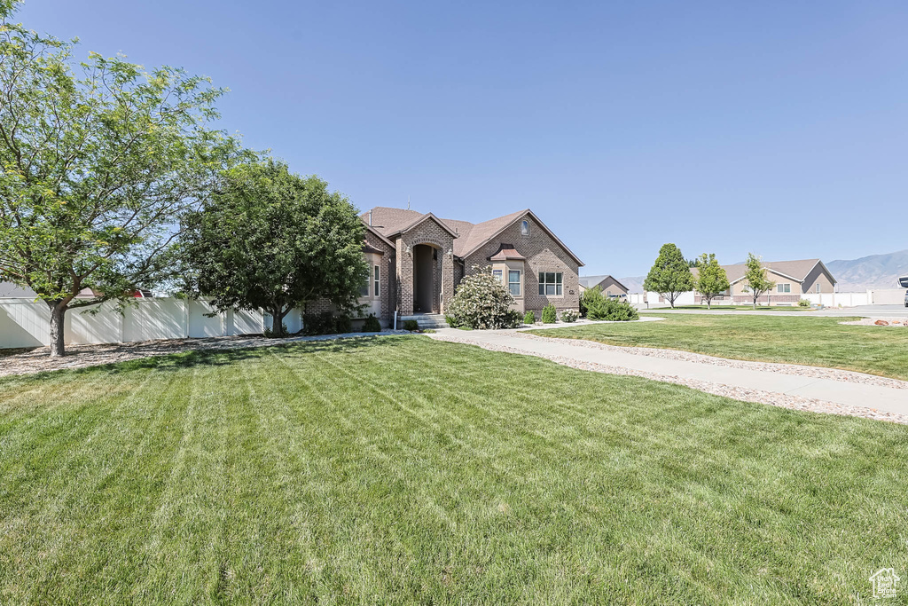 View of front of property featuring brick siding