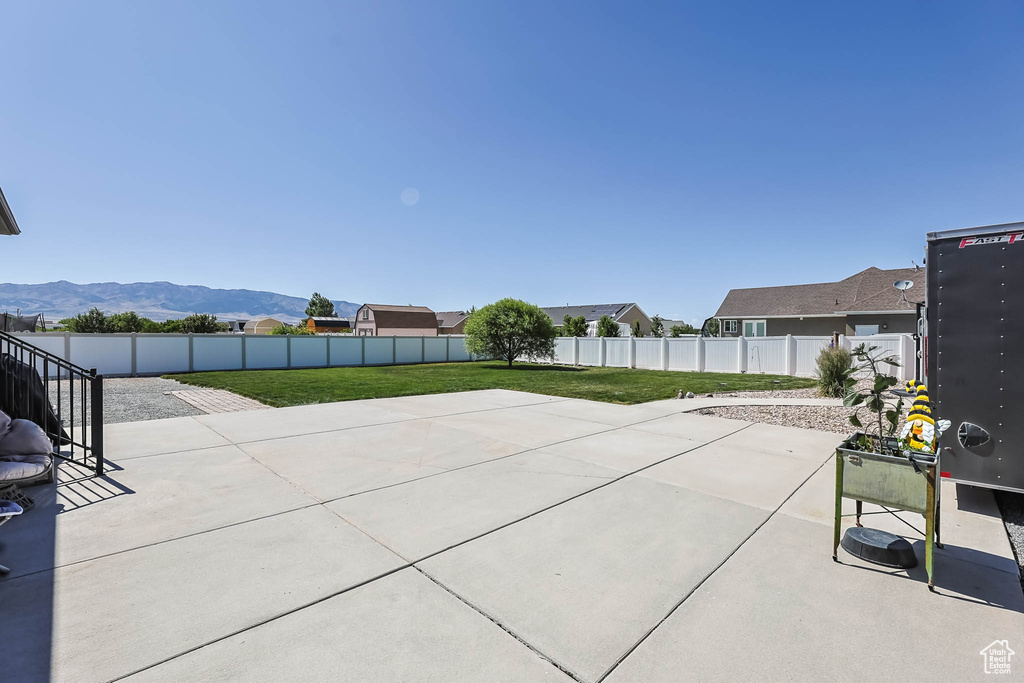 View of patio featuring a mountain view