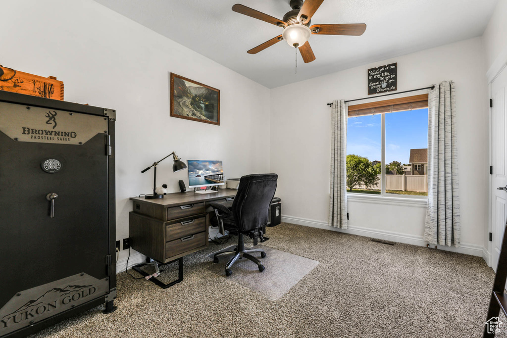Office featuring ceiling fan, carpet floors, and baseboards