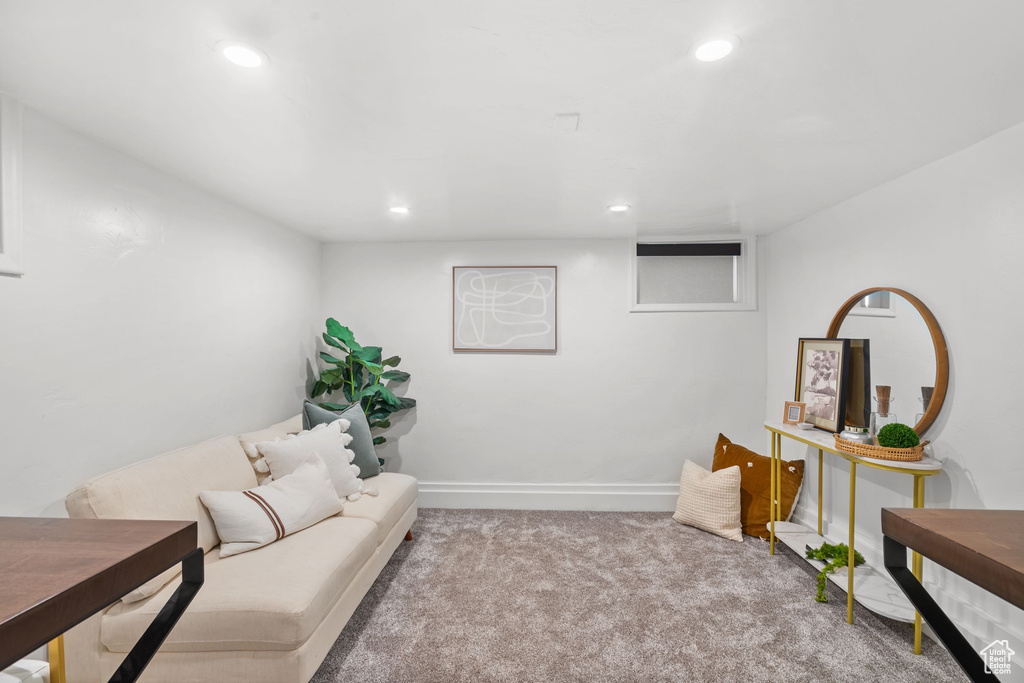 Living area featuring carpet floors, recessed lighting, and baseboards