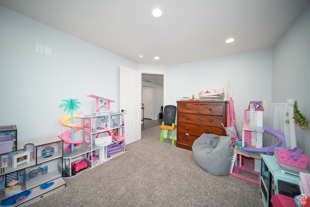 Recreation room featuring carpet and recessed lighting