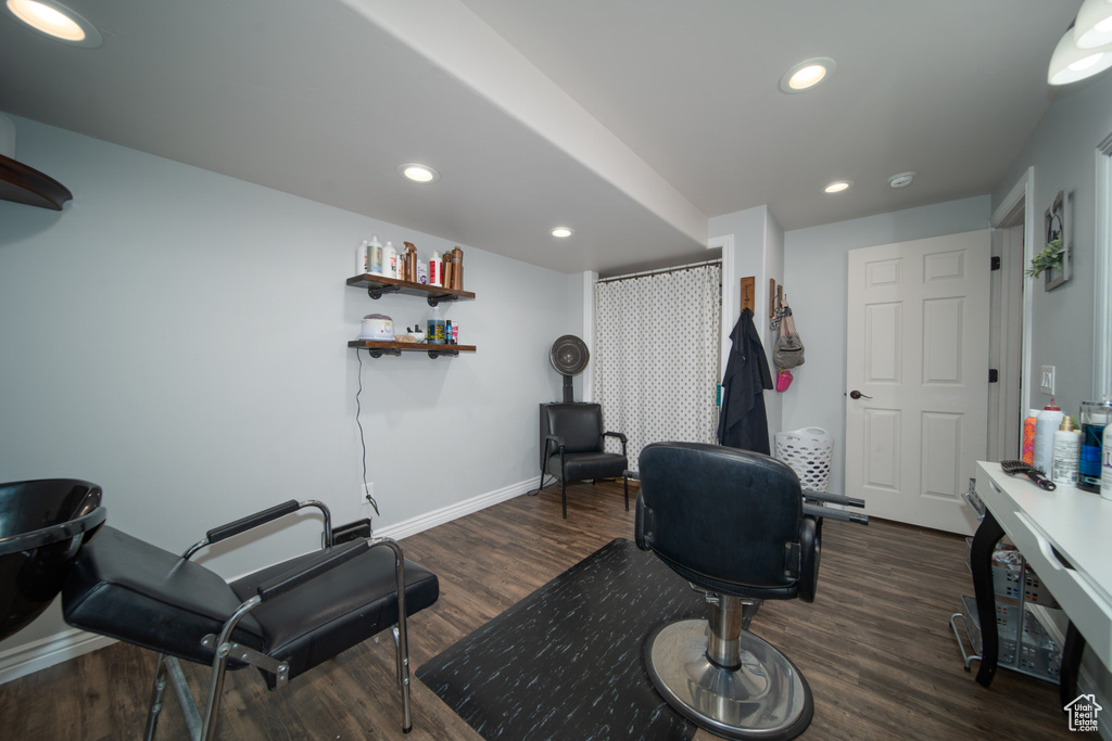 Home office with dark wood-style floors, recessed lighting, and baseboards