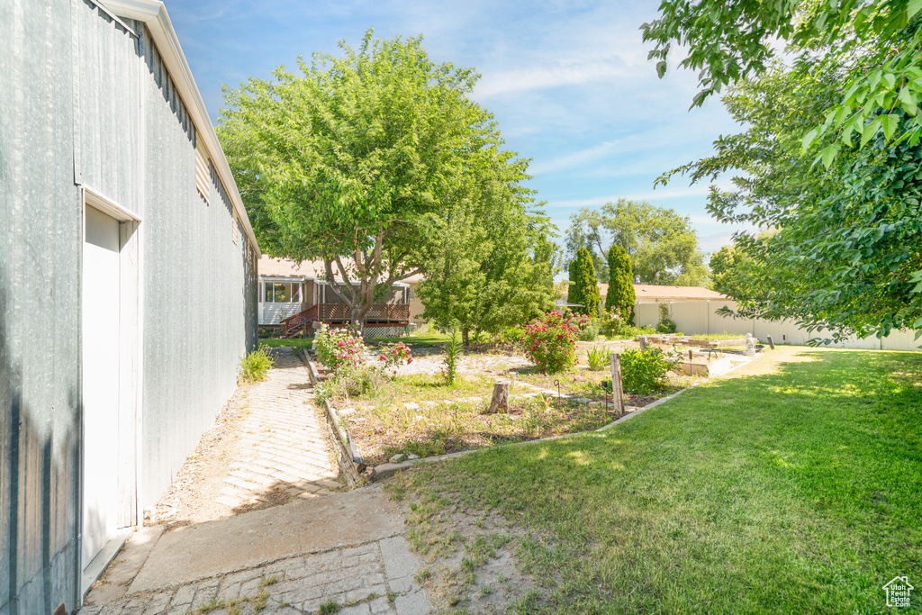View of yard featuring a vegetable garden