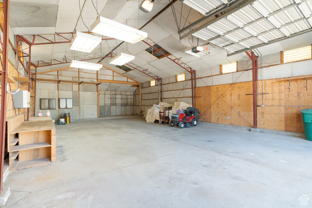 Garage featuring a garage door opener