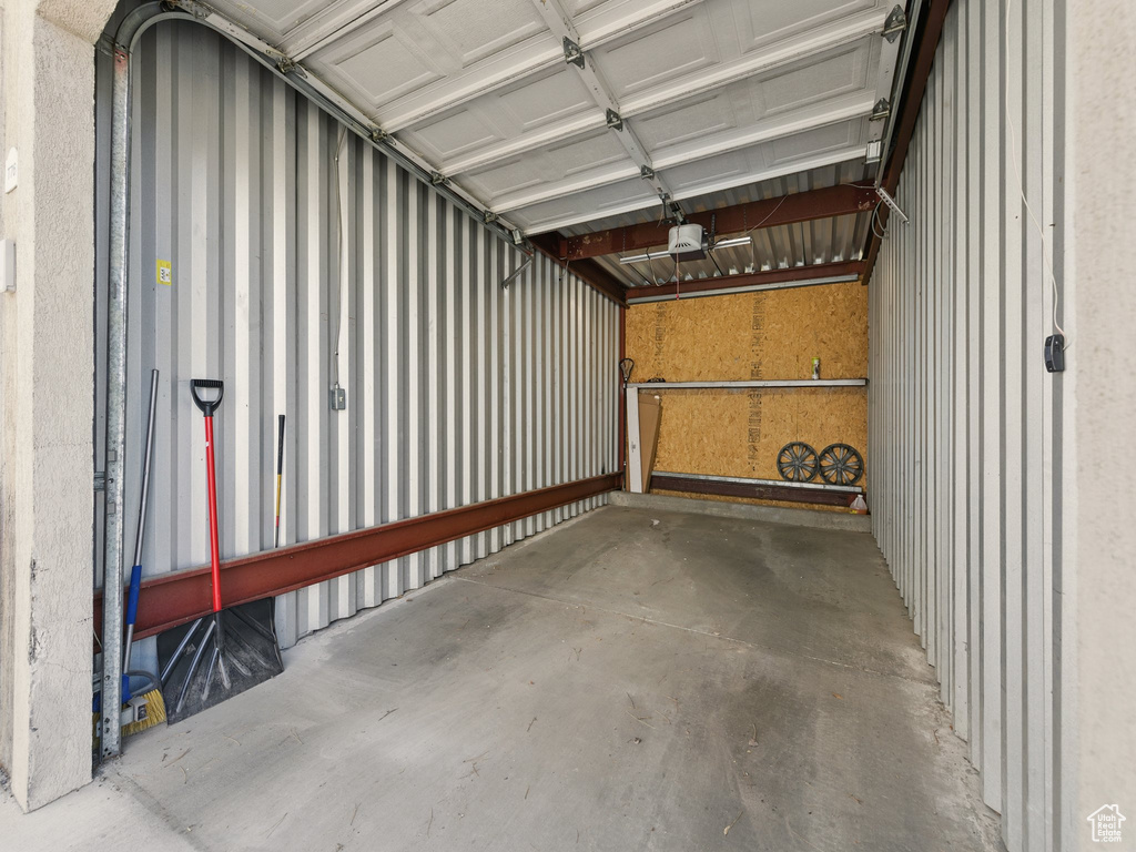 Garage featuring a garage door opener