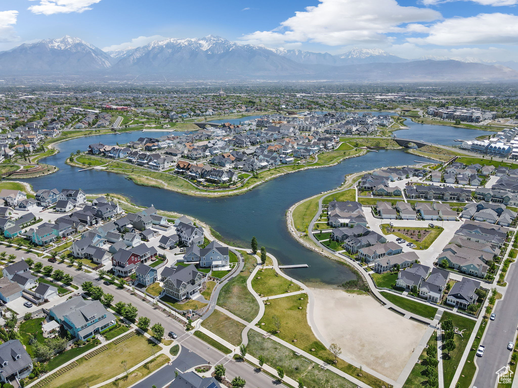 View of property location with nearby suburban area and a water and mountain view
