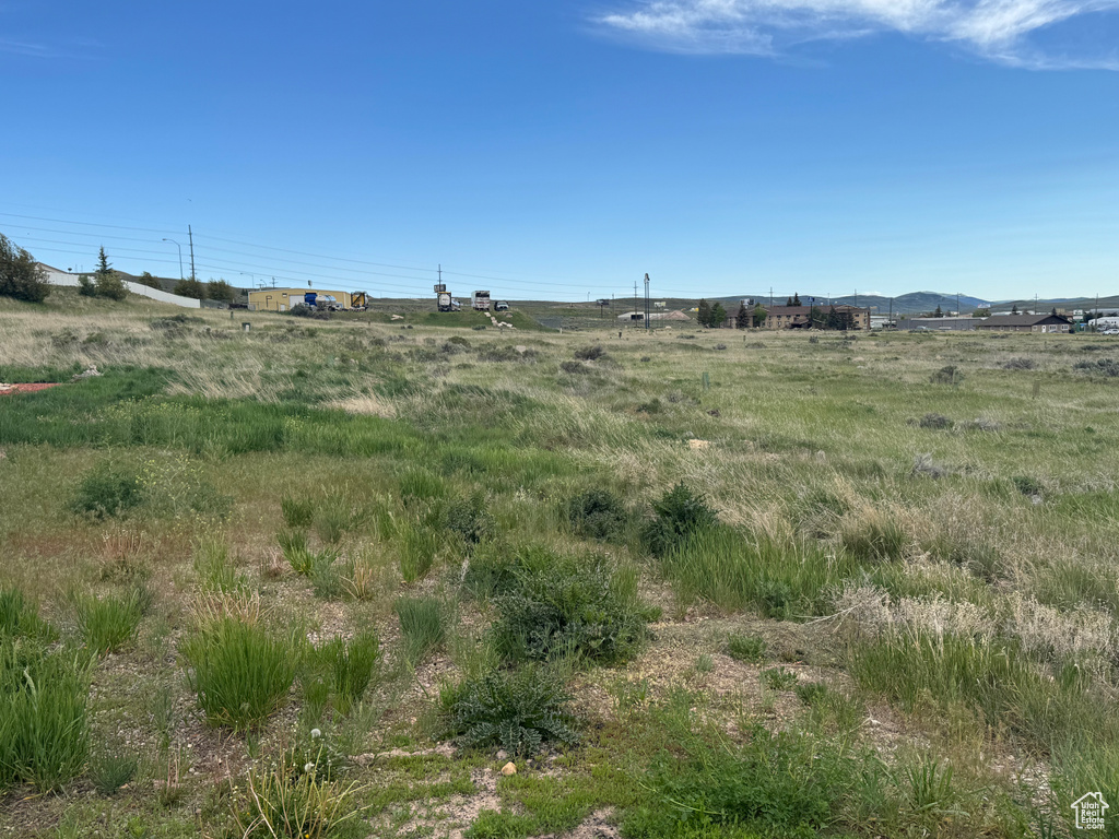 View of yard with a view of countryside