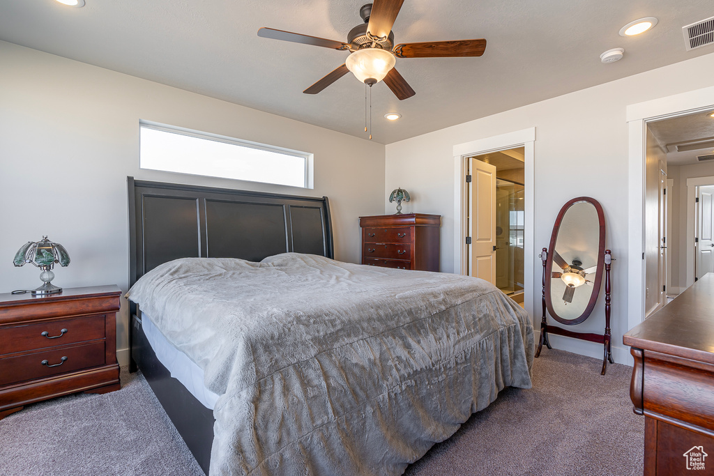Carpeted bedroom with a ceiling fan, baseboards, and recessed lighting