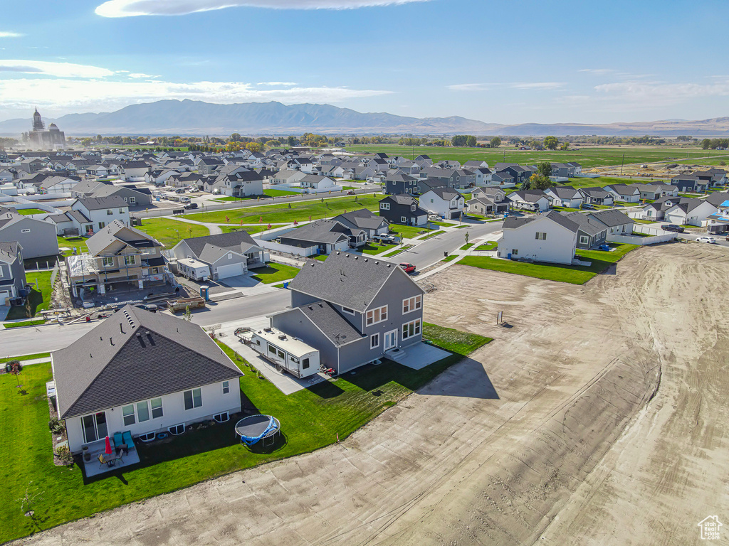 Aerial view of residential area with a mountain backdrop