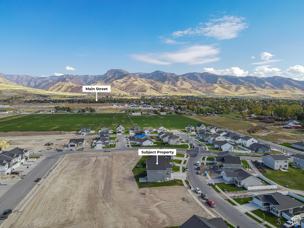 Aerial perspective of suburban area featuring mountains