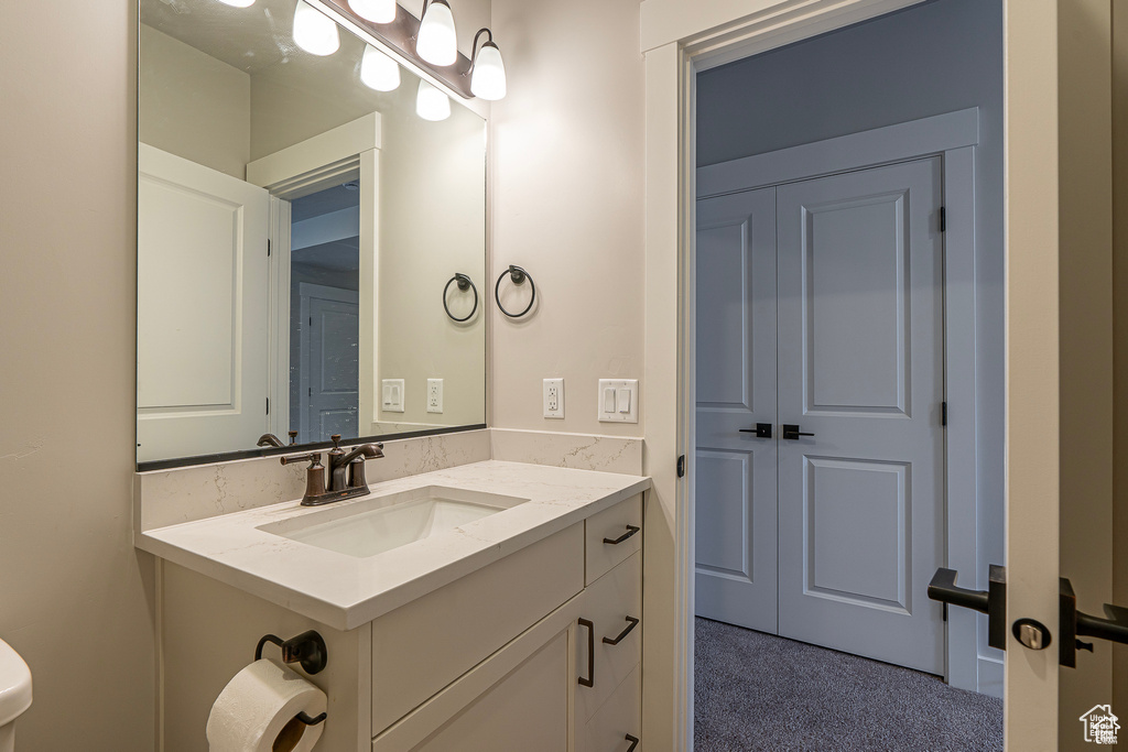 Bathroom with vanity and toilet