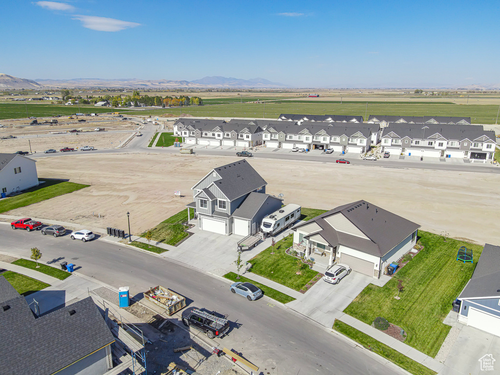 Aerial view of residential area with mountains