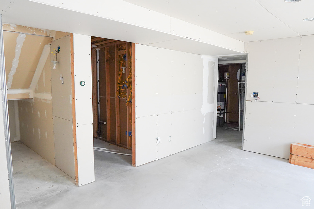 Unfinished basement with gas water heater