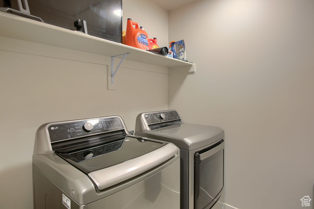 Laundry room with washer and dryer