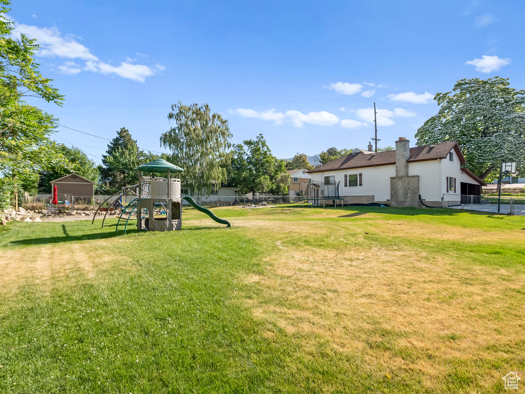 View of yard with a playground