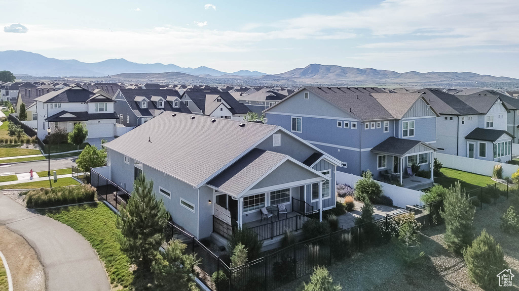 Aerial perspective of suburban area featuring mountains