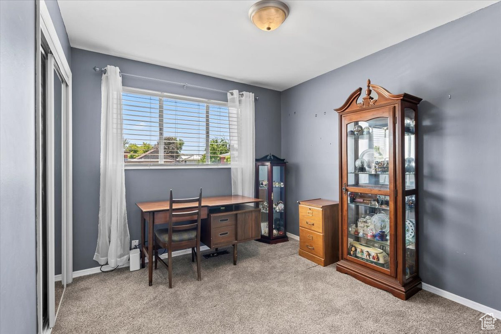Office featuring carpet flooring and baseboards