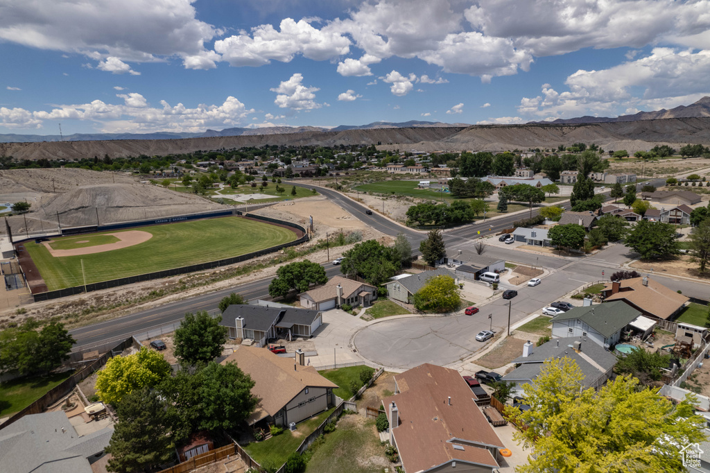 Aerial perspective of suburban area with mountains