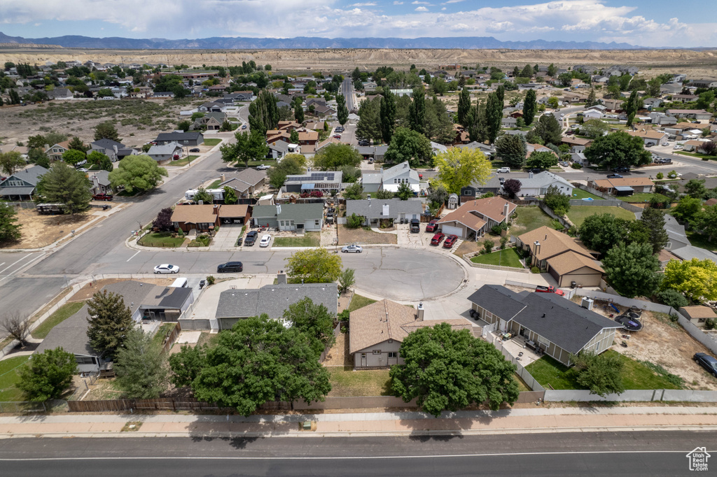 Aerial view of residential area with mountains