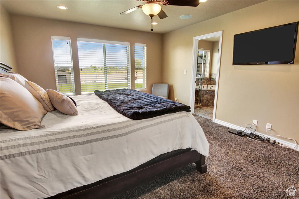 Bedroom featuring carpet floors, recessed lighting, connected bathroom, ceiling fan, and baseboards
