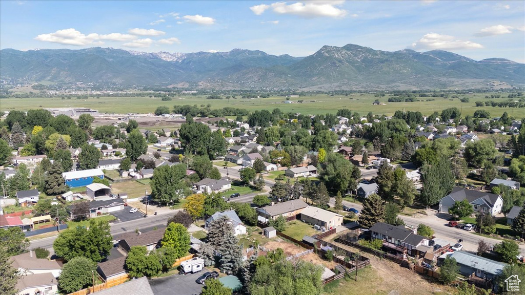 Aerial view of residential area with a mountain backdrop
