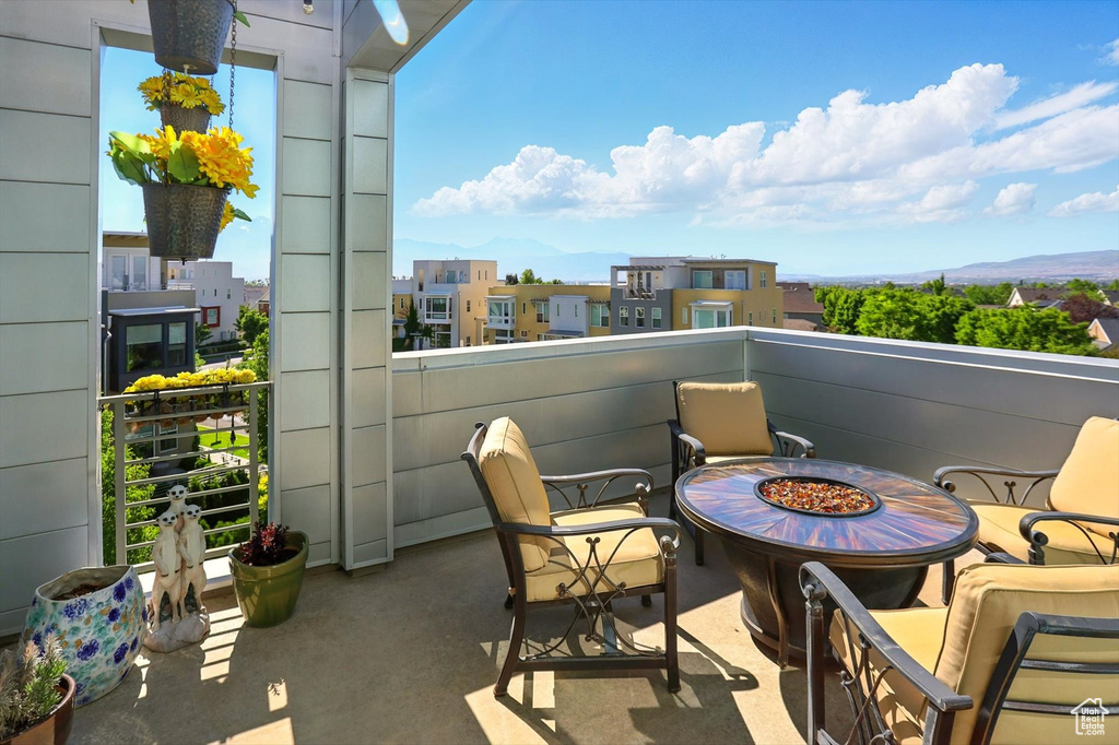 Balcony featuring a fire pit