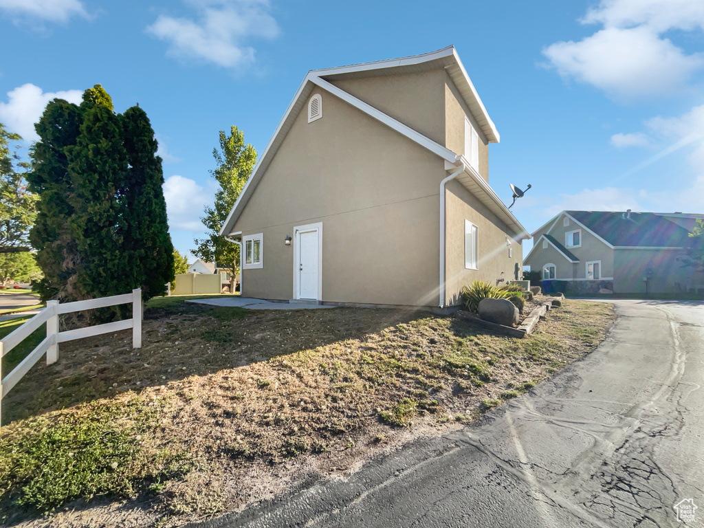 View of home\\\'s exterior featuring stucco siding