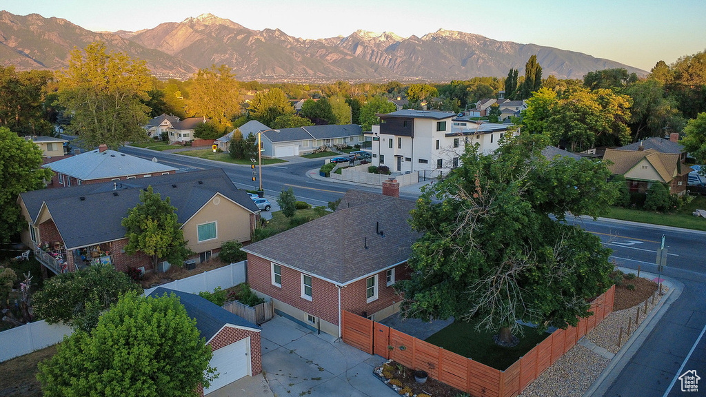 Aerial view of residential area with mountains