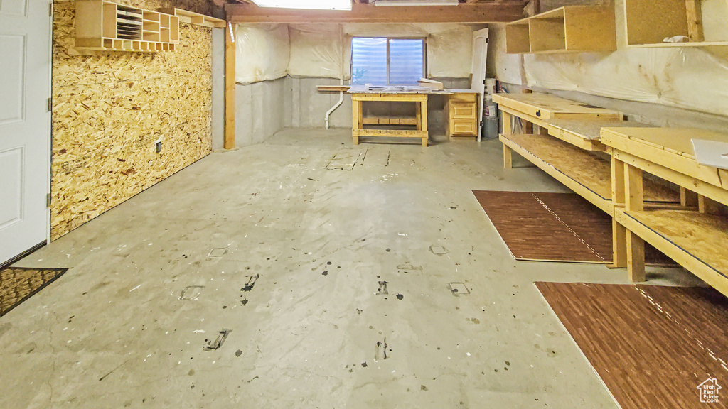 Below grade area featuring a workshop area