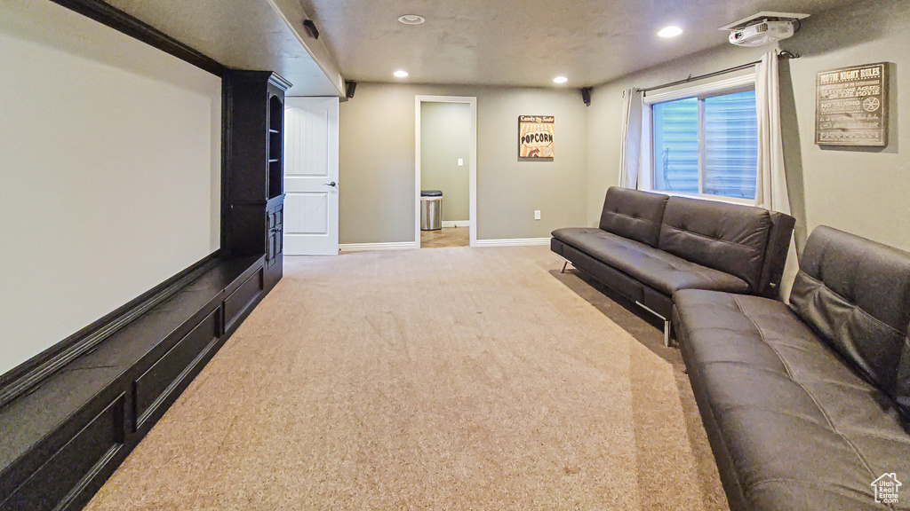 Cinema with recessed lighting and carpet floors