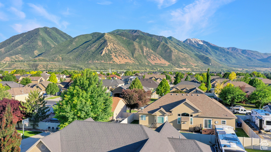 View of mountain background featuring nearby suburban area