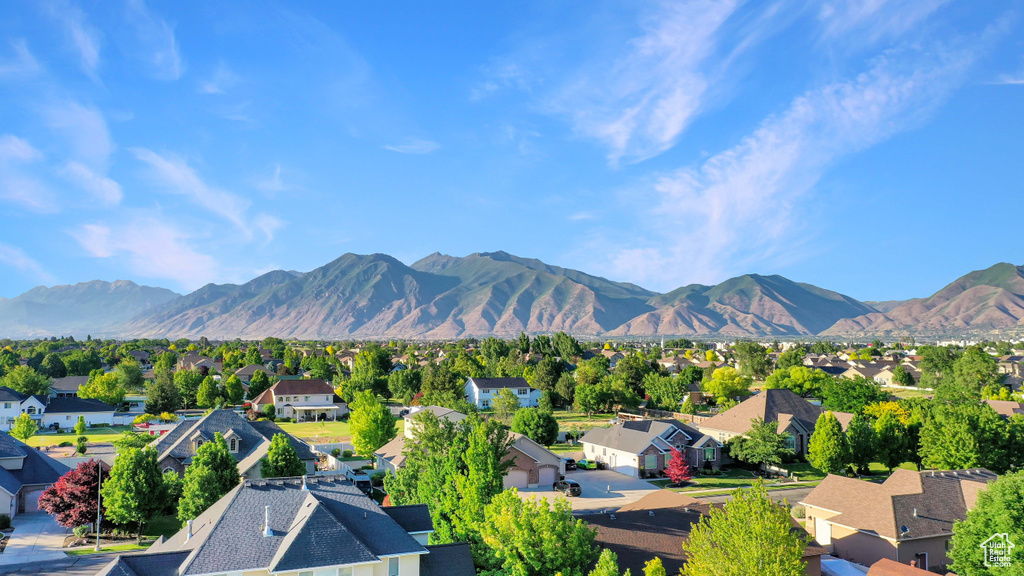 View of mountain backdrop with nearby suburban area