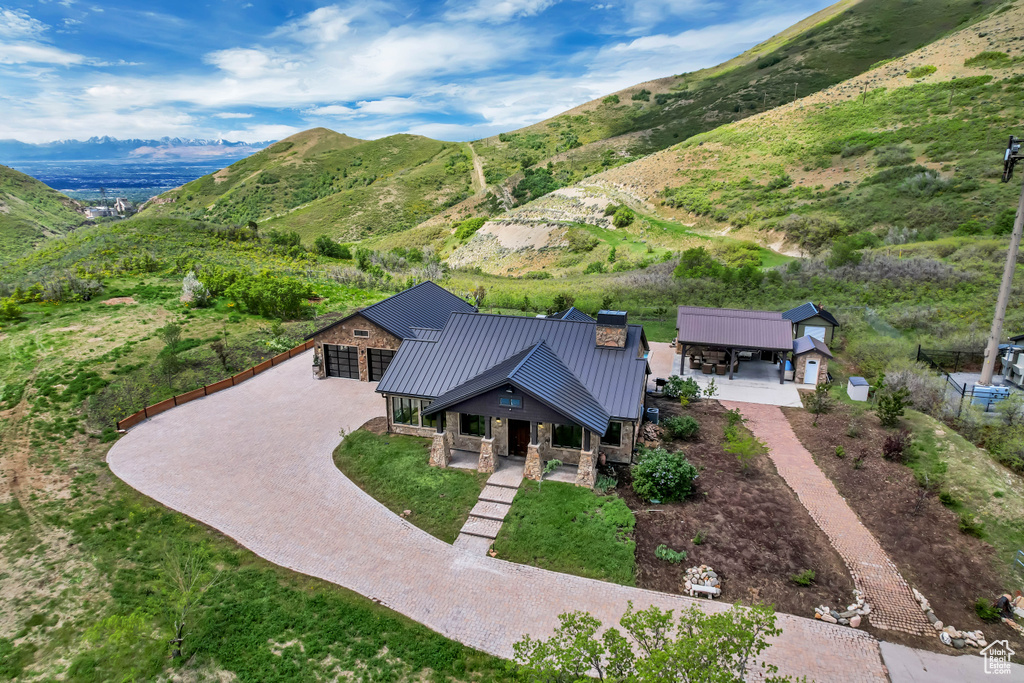 View from above of property featuring a mountainous background