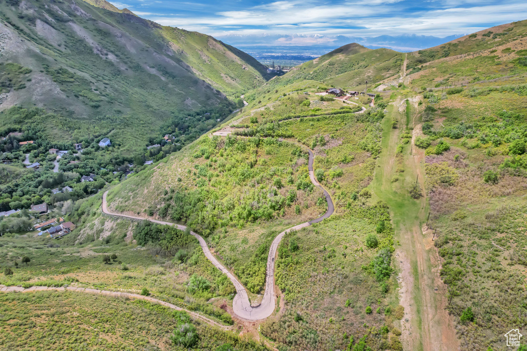 Aerial view of property\'s location with a mountainous background