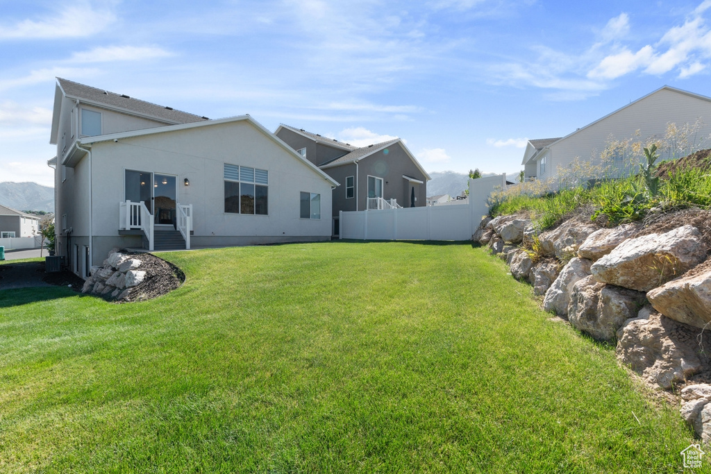 Back of property with stucco siding