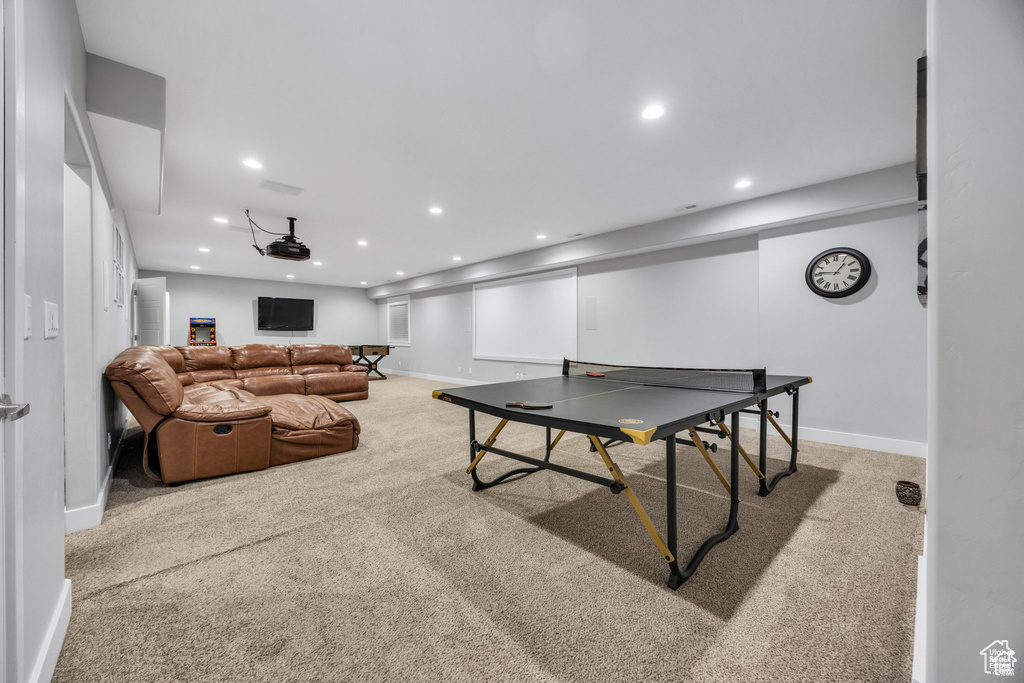 Rec room with recessed lighting and carpet