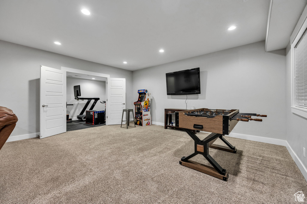 Workout area featuring recessed lighting and carpet flooring