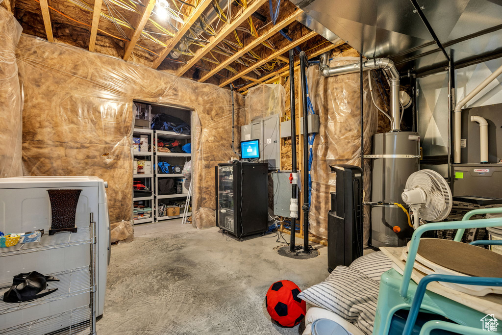 Unfinished below grade area featuring secured water heater