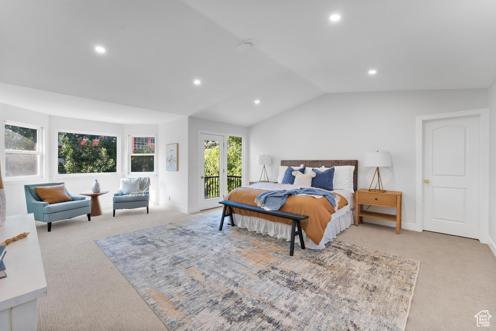 Bedroom with carpet flooring, access to exterior, recessed lighting, vaulted ceiling, and baseboards