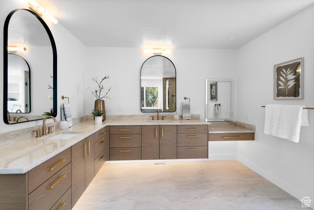 Full bath featuring vanity