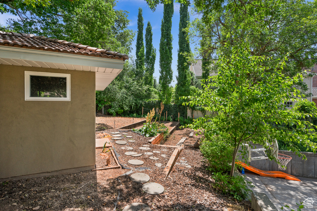 View of yard featuring a vegetable garden