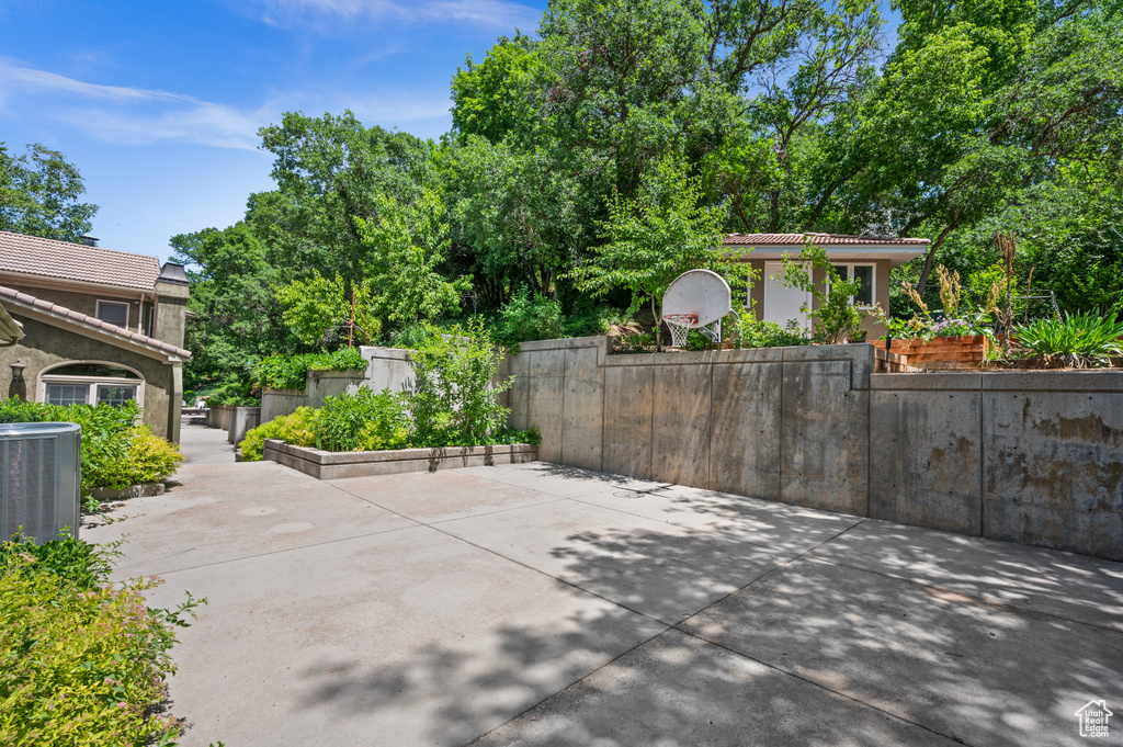 View of patio / terrace featuring cooling unit