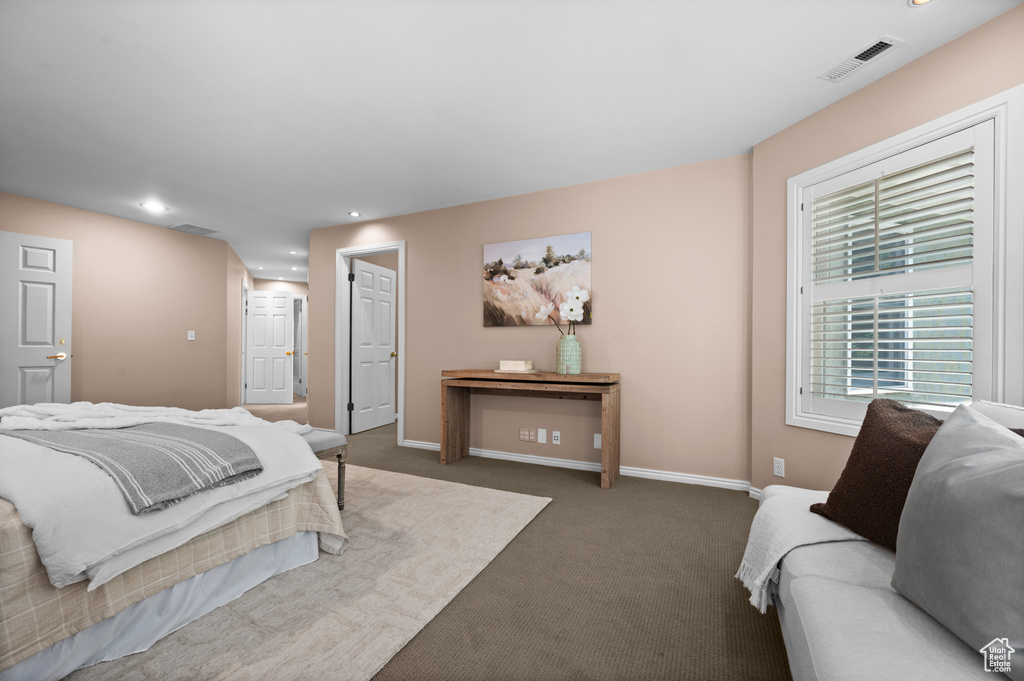Bedroom featuring carpet, baseboards, and recessed lighting