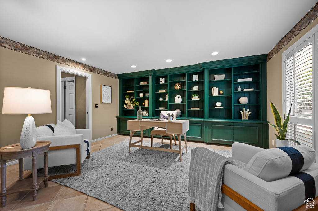 Living room with light tile patterned flooring, an office area, recessed lighting, and baseboards