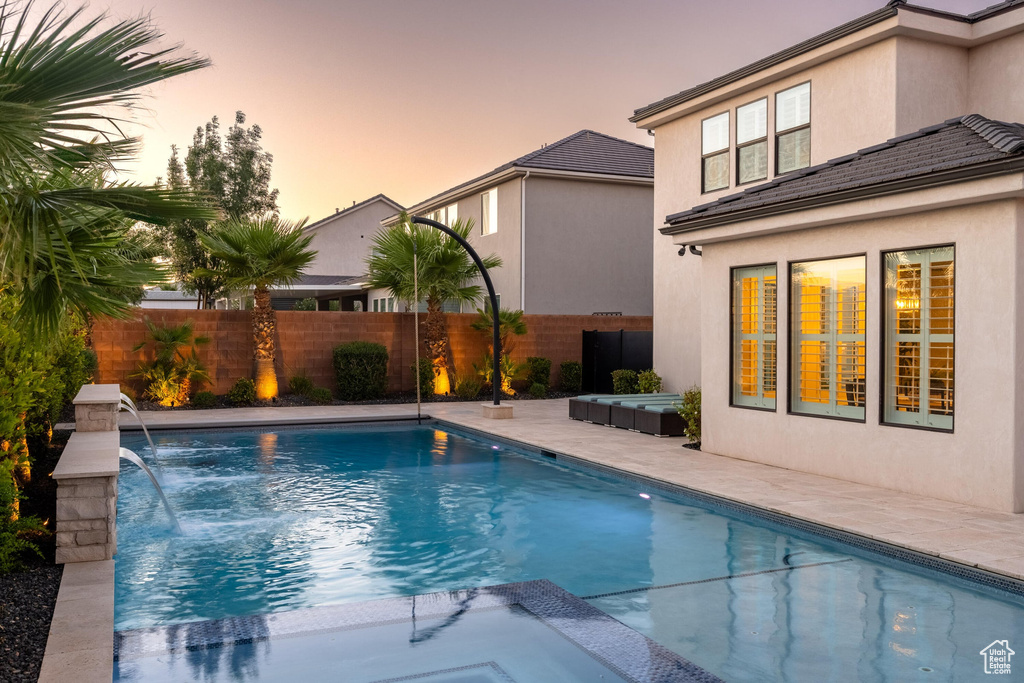 View of swimming pool featuring a patio
