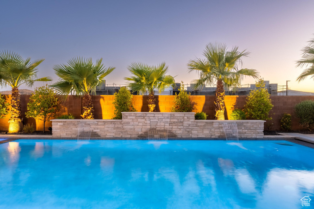 View of pool featuring a fenced backyard
