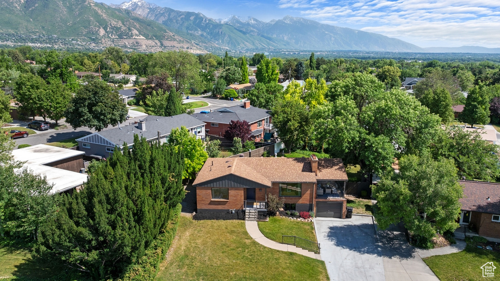 Aerial perspective of suburban area with mountains